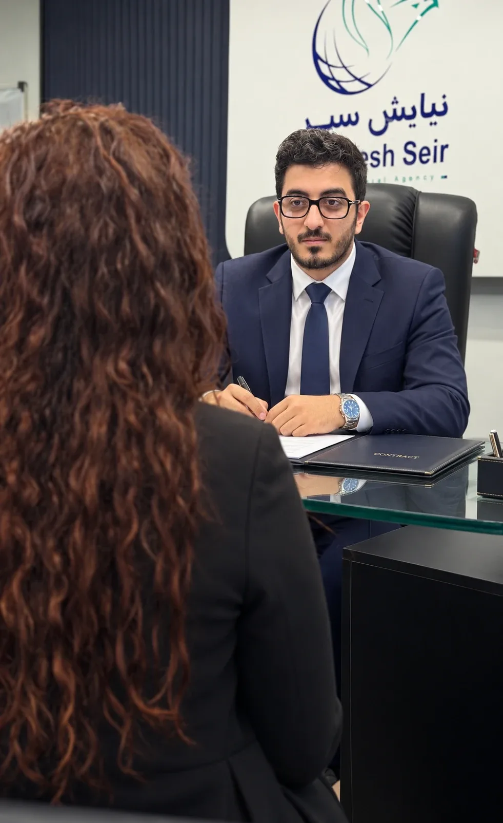 A Jahan Academy advisor speaking with prospective students